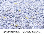 Small photo of A pile of shredded papers, documents and files. Data protection, destruction or erasure background.
