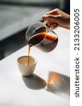 Pouring Delicious Coffee Into A ...