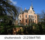 Small photo of Herentals, Belgium, 02-18-2022, Storm damage by storm Eunice, broken large tree, Le Paige castle, Herentals, Belgium.