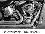 Small photo of Shiny chromium plated v-shaped engine stock photo
