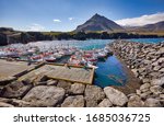 Summertime, Beautiful panoramic view of Fishing ships (boats) in Arnarstapi harbor at Snaefellsnes peninsula in West Iceland. Famous landmark. Fishing village. Travelling concept background. Postcard.