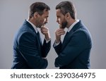 rival strategy of businessmen isolated on grey. business competition and rivalry. rival business company. businessmen having rivalry. rivalry in the business world. solving business problems