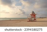 Small photo of lifeguard at miami beach in summer, copy space. lifeguard at miami beach vacation.