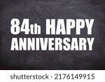 Small photo of 84th happy anniversary text with blackboard background for couple and Anniversary
