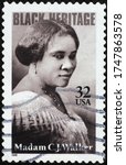 Small photo of Milan, Italy - March 26, 2020: Black heritage, Madam C.J.Walker on american stamp