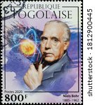 Small photo of Milan, Italy - August 01, 2020: Portrait of Niels Bohr on postage stamp of Togo