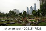 Small photo of Central Jakarta, Indonesia - Oct, 21, 2021: The TPU Karet Bivak Cemetery with an area of: 16.2 hectares (0.16 km2; 0.06 sq mi) is located in Central Jakarta.