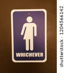 Small photo of Gender free bathroom, whichever sign.