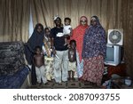 Small photo of Mogadishu, Somalia - September 28, 2011 - Family portrait photograph of a fisherman in Somalia.