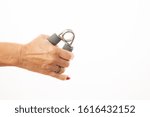 Small photo of female right hand exercising with a hand griper isolated in white background