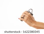 Small photo of female hand exercising with a hand griper isolated in white background