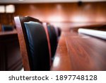 Small photo of Table and chair in the courtroom of the judiciary.