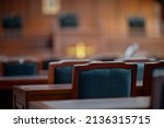Small photo of Table and chair in the courtroom of the judiciary