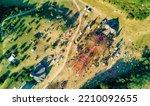 Small photo of Ozora: a hungarian goa psy trance summer festival's main stage with colorful design by an aerial upsidedown shot