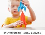 boy play with rocket child toy... | Shutterstock . vector #2067160268