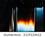 Small photo of Glitch overlay. Broken screen texture. Fractured monitor. Blue orange white glow artifacts dust scratches noise on dark black distorted rough surface abstract wallpaper.