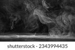 Small photo of Smoke vapor. Steam cloud. Fume swirl. White fog spreading over grain texture surface on dark black copy space abstract background.