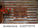  A Rustic Wooden Cabin With...