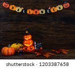 halloween  pumpkin and black... | Shutterstock . vector #1203387658