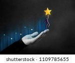 Customer Journey or Business Success Concept. Hand Raised and Support Human Shape with Care to Reach a Golden Star, Diagram Graph as background