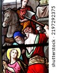Small photo of Saint Germain church. Stained glass window. Martyrdom of St. Barbara beheaded by her father. La Fere Loupiere. France. 09-30-2019