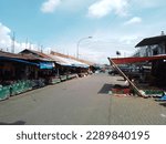 Small photo of Daya Traditional Market, Makassar, South Sulawesi, Indonesia - April 16th, 2023: Situation of a traditional market during Ramadan at noon. The place looks quiet and deserted.