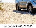 Car Wheels On A Sea Beach Sand. ...