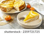 Small photo of Healthy autumn dessert for breakfast. Pumpkin cottage cheese casserole pie "Zebra", striped casserole with cheese, chocolate and pumpkin on stone background.