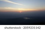 Small photo of The first part of the day that everyone has to climb to the top of the mountain at the highest point in order to see the sunrise at an unobstructed point, making this photo beautiful and in exchange f