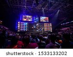 Small photo of MOSCOW, RUSSIA - 14th SEPTEMBER 2019: esports Counter-Strike: Global Offensive event. Big illuminated main stage of a computer games tournament located on a big stadium. Tribunes are full of games