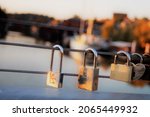 Love locks attached to the bridge railing