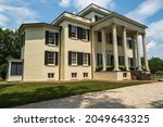 Leesburg, VA, USA -- .A wide angle photo of the historic Oatlands Mansion on a hot summer day in Leesburg, VA.