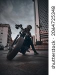 Small photo of NAPLES, ITALY, 27 OCT 2021: HARLEY DAVIDSON IN AN URBAN CONTEST WITH BIKER
