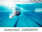 Competitive swimmer racing in...