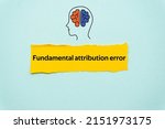 Small photo of Fundamental attribution error.The word is written on a slip of colored paper. Psychological terms, psychologic words, Spiritual terminology. psychiatric research. Mental Health Buzzwords.