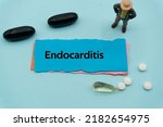 Small photo of Endocarditis.The word is written on a slip of colored paper. health terms, health care words, medical terminology. wellness Buzzwords. disease acronyms.