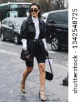 Small photo of Paris, France - March 5, 2019: Street style outfit - Camila Coelho before a fashion show during Paris Fashion Week - PFWFW19