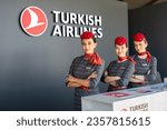 Small photo of Turkish Airlines stewardesses at Teknofest Ankara. Cabin crew members, smiling women portrait. Ankara, Turkey - August 30, 2023.