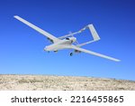 Bayraktar TB2 Unmanned aerial vehicle gliding through the sky. Bayraktar TB2 combat drone in flight over the skies.