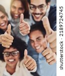 Small photo of Thumbs up from a happy business team excited about the success they achieve together at work. Overhead view diverse group of corporate people excited by success and give approval to winning