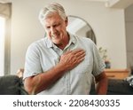 Senior man, heart attack and stroke at home for emergency health risk, breathing problem and cardiology accident. Sick elderly male with chest pain cancer, cardiovascular disease and heartburn injury