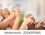 Small photo of Diversity, community collaboration and holding hands in air strong together or racial empowerment march. Peace protest, trust teamwork and friendship help or friends, group or support human rights