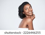 Small photo of W e all want to look our best with minimal effort. Shot of a beautiful young woman posing against a white background.