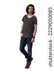 Small photo of He has a devil-may-care attitude. Handsome young casual man standing against a white background - full length.
