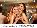 Small photo of Portrait, champagne and clubbing with woman friends drinking alcohol in celebration of the new year. Party, diversity and event with a female and friend enjoying a drink together at a luxury social
