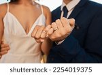 Small photo of Love, wedding or hands of a couple promise trust, support or commitment in a romantic celebration event. Interracial marriage. Zoom, black woman and man together as bride and groom in a partnership