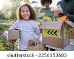 Small photo of Food, donation and portrait of child in park with smile and grocery box, healthy diet at refugee feeding project. Girl, charity and donations help feed children and support from farm volunteer at ngo