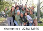 Small photo of Teamwork, community and portrait of people cleaning park, forest and woods for healthy environment. Support, charity and group of volunteers smile for eco friendly, recycling and sustainable earth