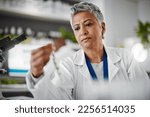 Small photo of Plant scientist, thinking or test tubes in laboratory pharma, medical science research or gmo food engineering. Woman, biologist or glass equipment in leaf healthcare, sustainability growth or study