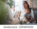 Small photo of This is a normal reaction. Shot of an attractive young woman sitting with her daughter during a consultation with a psychologist.